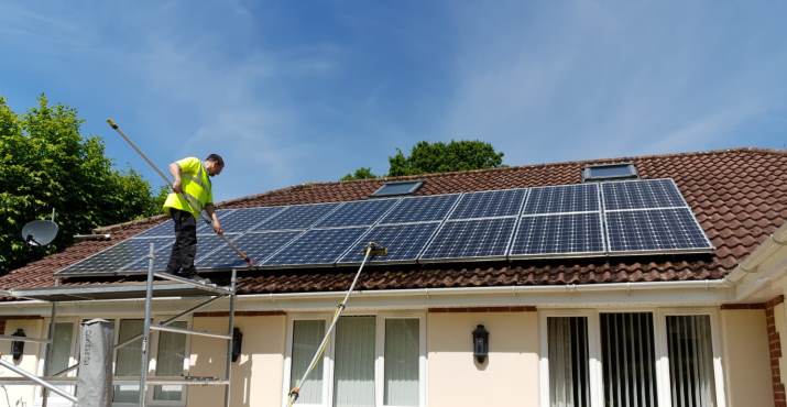 Wagner Renewables team cleaning solar panels