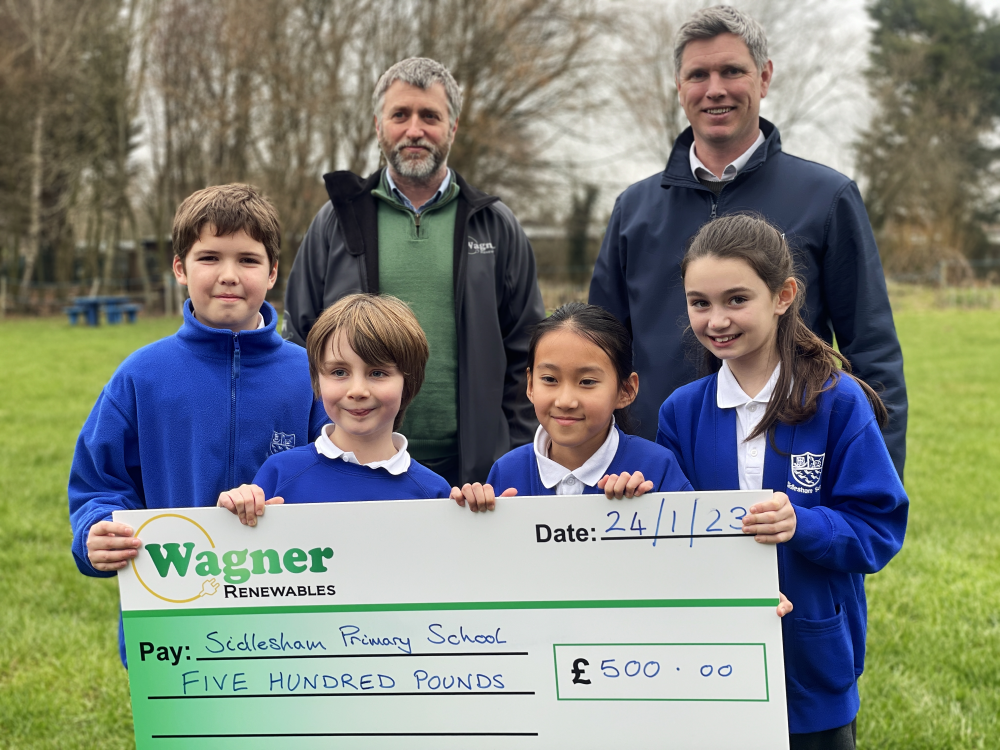 Sidlesham Primary School receiving a charity donation from Wagner Renewables Ltd