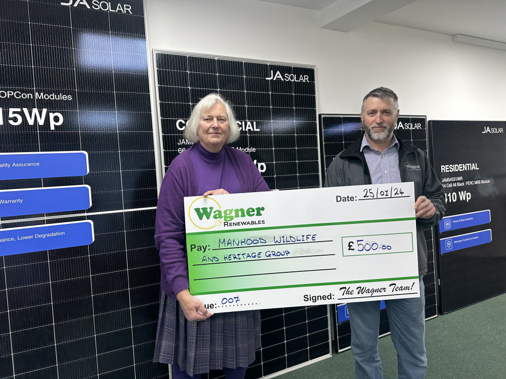 Wagner Renewables Presenting a £500 cheque to Manhood Wildlife Group