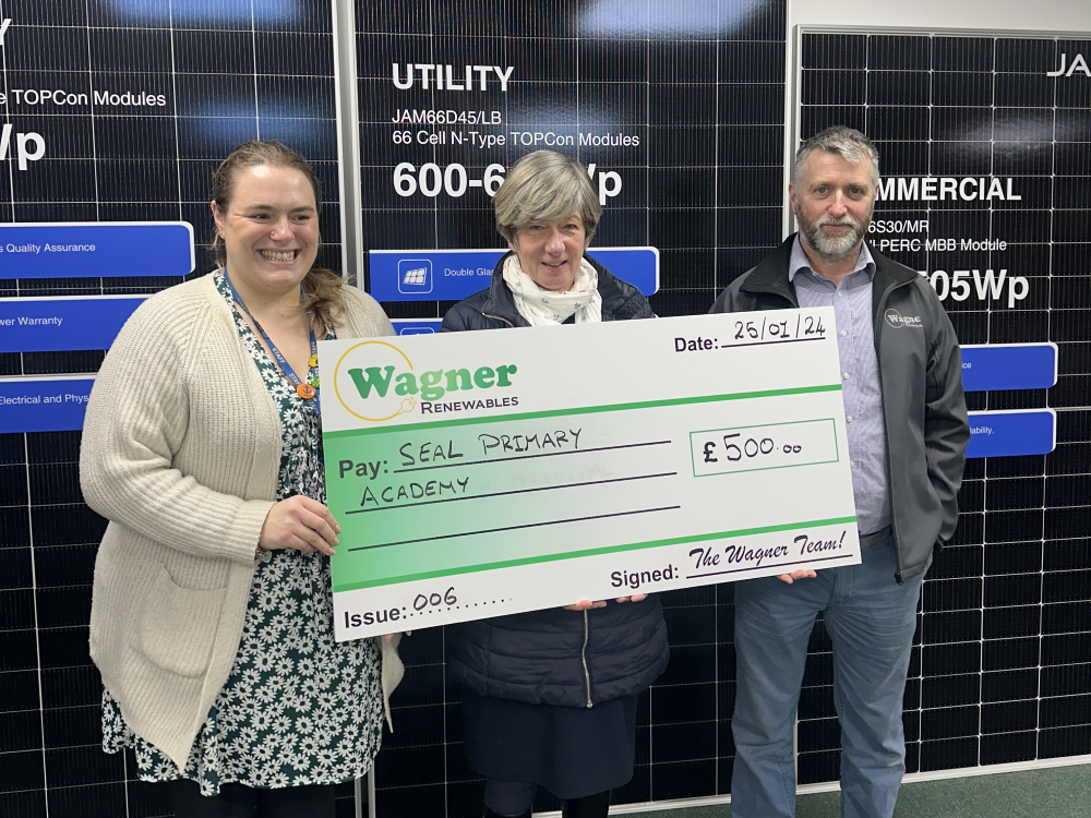 Wagner Renewables presenting a £500 cheque to Seal Primary Academy
