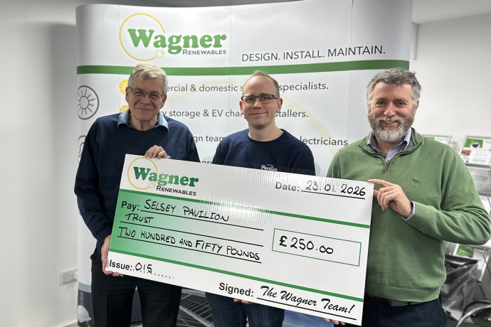 Two representatives from The Selsey Pavillion Trust receiving a cheque from Wagner Renewables.